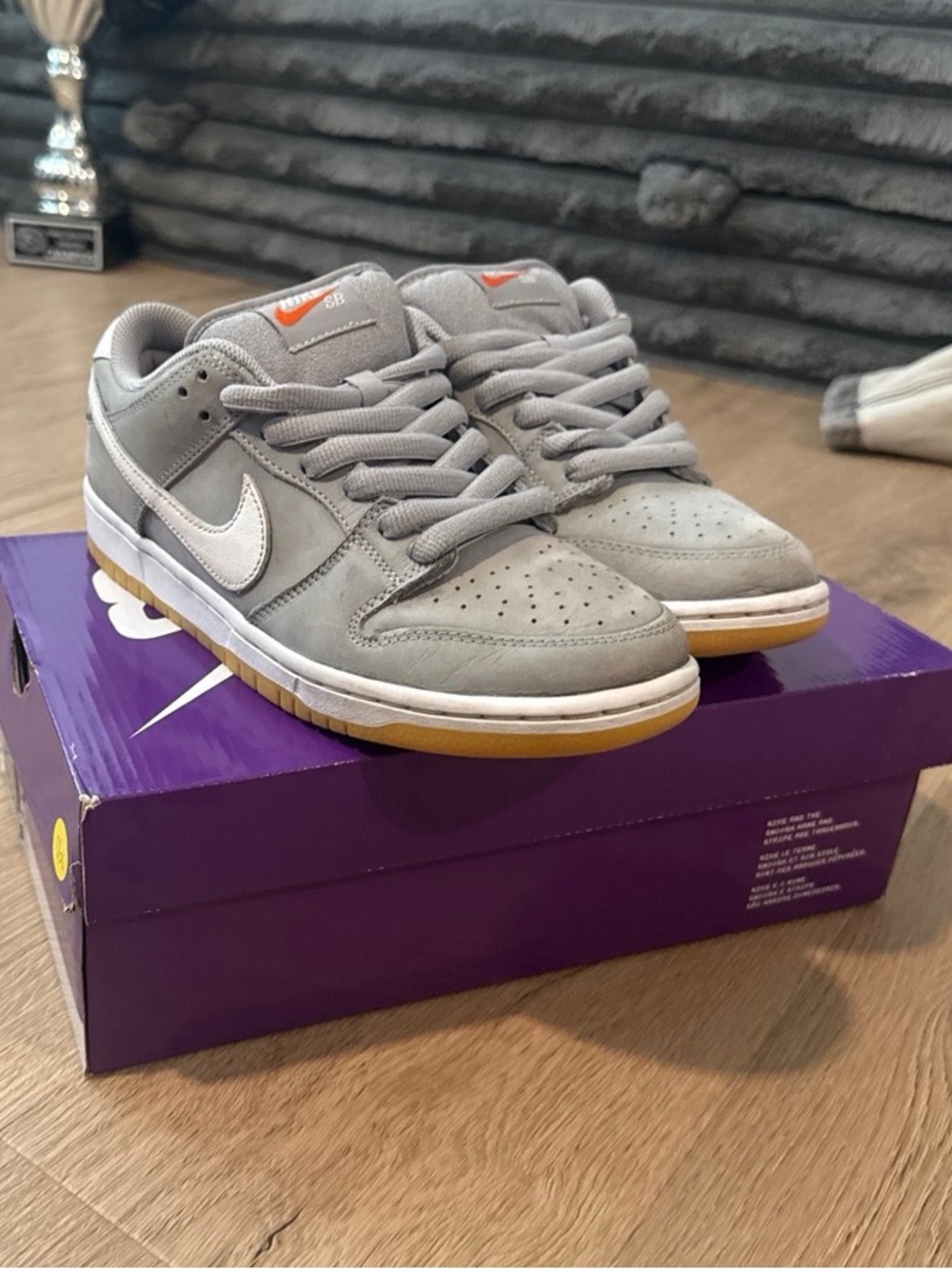 Nike Gray Suede Low-Top Sneakers with White Swoosh